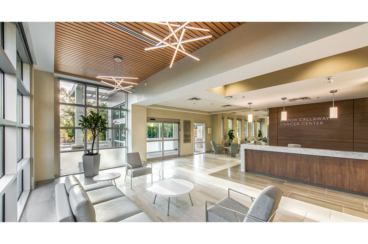 view of lobby with ceiling and light feature