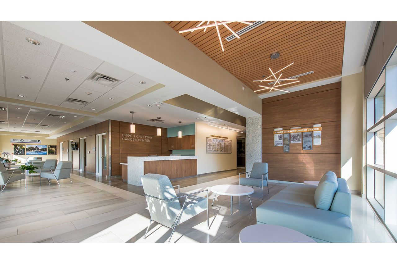 lobby view of reception desk and seating area