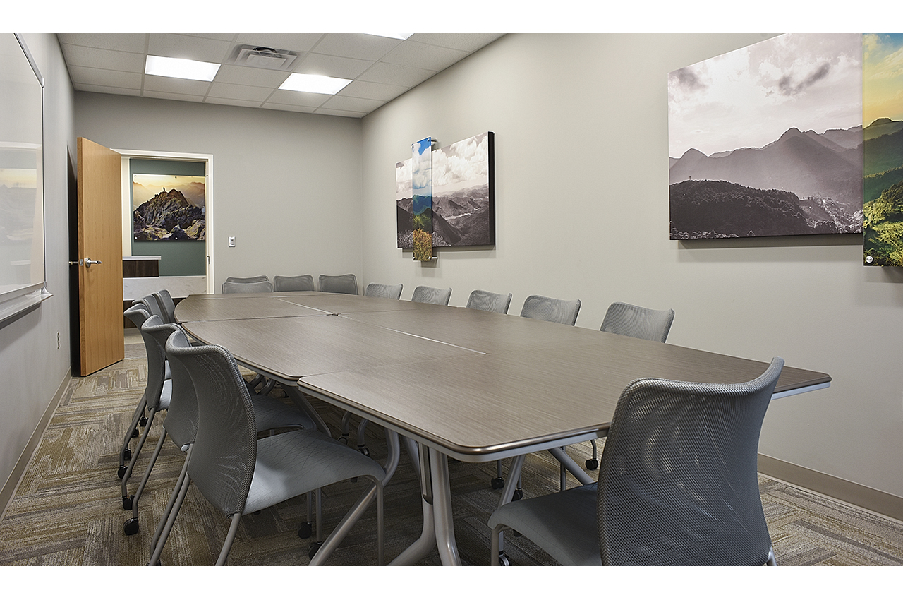 total healthcare board room at russell medical center with global seating and abstract photography